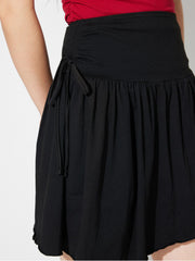 Black draped wrap mini skirt with tie detail and ruched waist