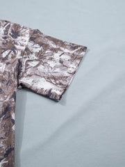 Woodland camouflage drop shoulder tunic with crew neck and short sleeves.
