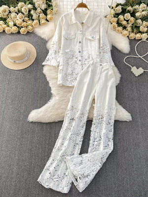 White lace-embellished two-piece set with button-up jacket and wide-leg pants.