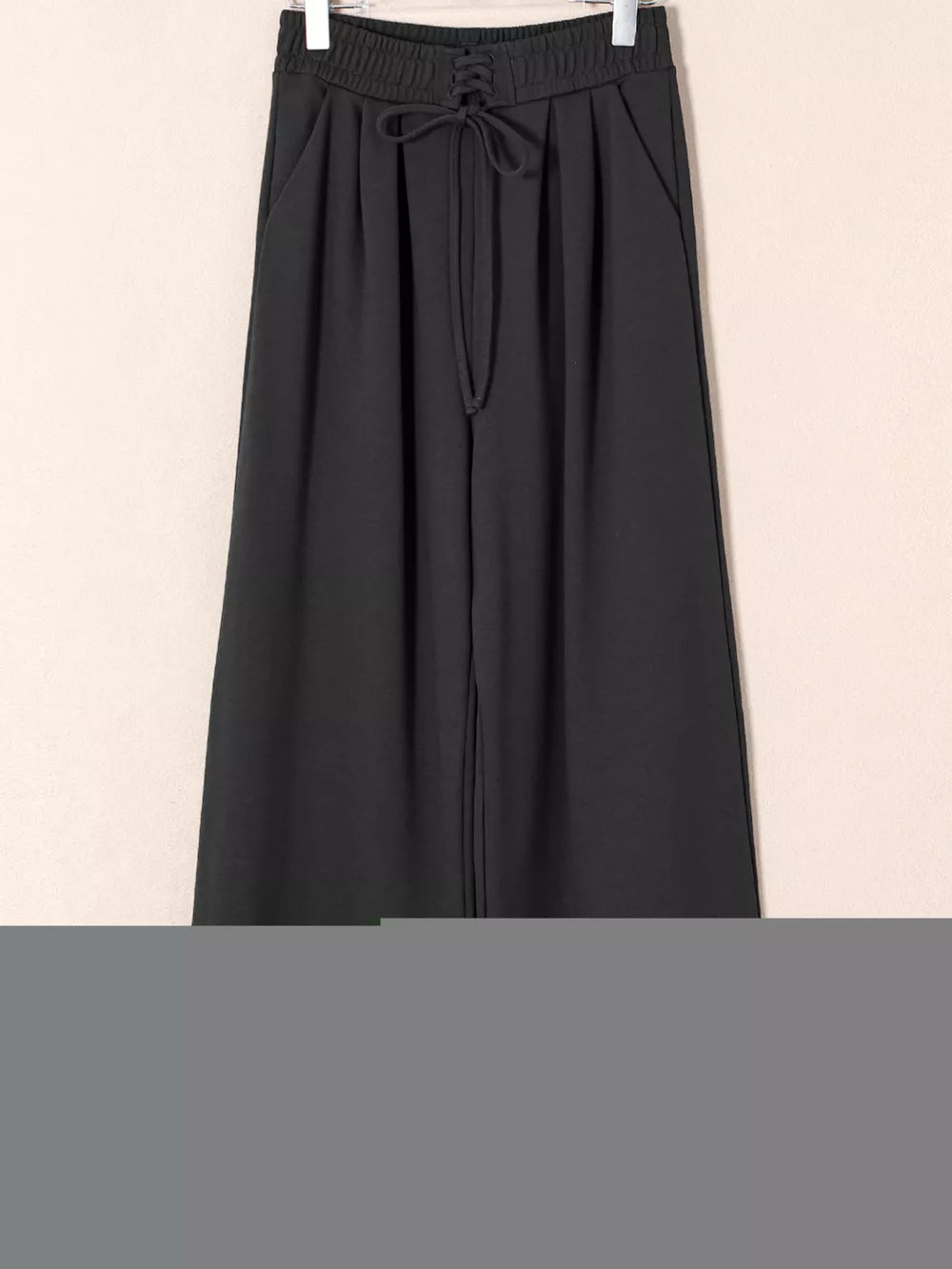 Black cotton maternity pants with drawstring high waist and pleats