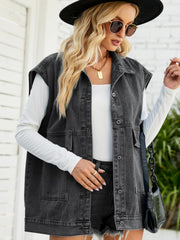 Dark denim utility vest with oversized pockets and collared neckline.