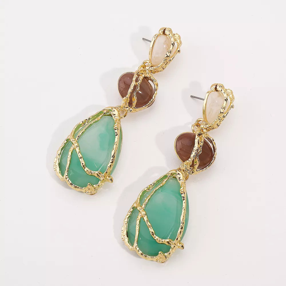 Gold-plated dangle earrings with teardrop green and brown stones and cream accents
