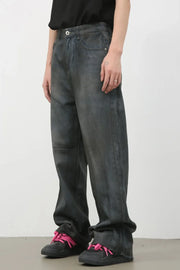 Washed denim wide-leg trousers in dark, featuring a relaxed fit and casual styling.