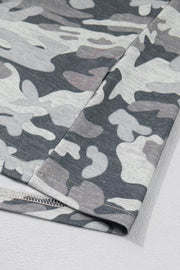 Camouflage relaxed V-neck tee with grey and white pattern.