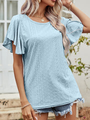 Light blue eyelet flutter sleeve blouse with a textured pattern.