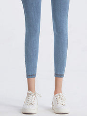 Denim Illusion Sculpt Leggings in Light wash denim, cropped length with double stitched hem.