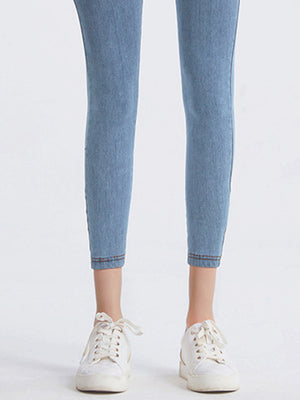 Denim Illusion Sculpt Leggings in Light wash denim, cropped length with double stitched hem.