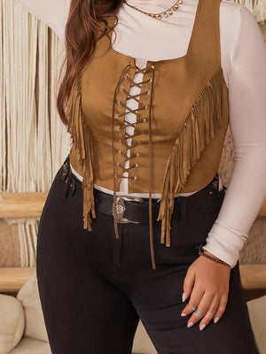 Caramel faux suede vest with fringe and lace-up front detail.