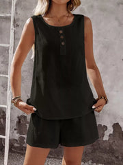 Black cotton two-piece set with decorative buttons on the sleeveless top and matching shorts.