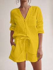 Yellow textured cotton pajama set with button-up top and drawstring shorts