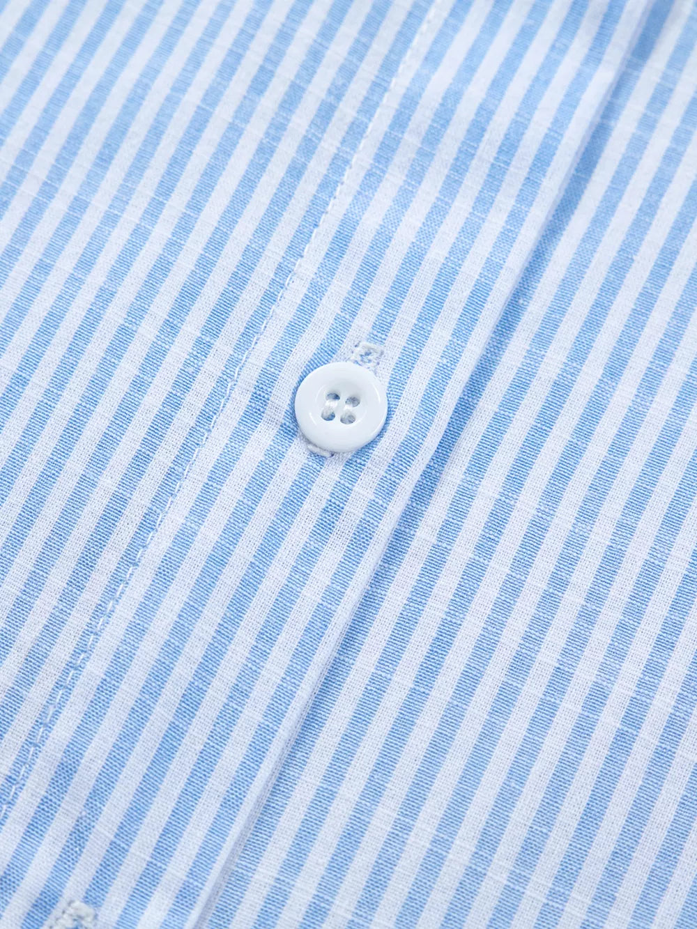 Blue and white striped button-down shirt with white buttons.