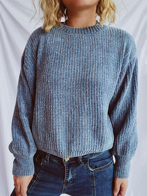 Light blue textured ribbed knit relaxed crewneck pullover sweater with balloon sleeves.