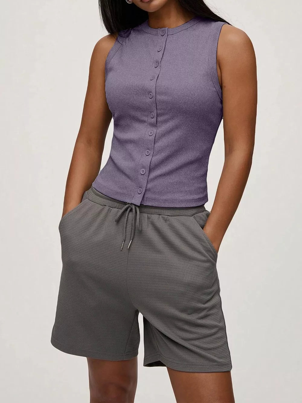 Sleek ribbed button-front tank top in dark purple, fitted with a crew neck.