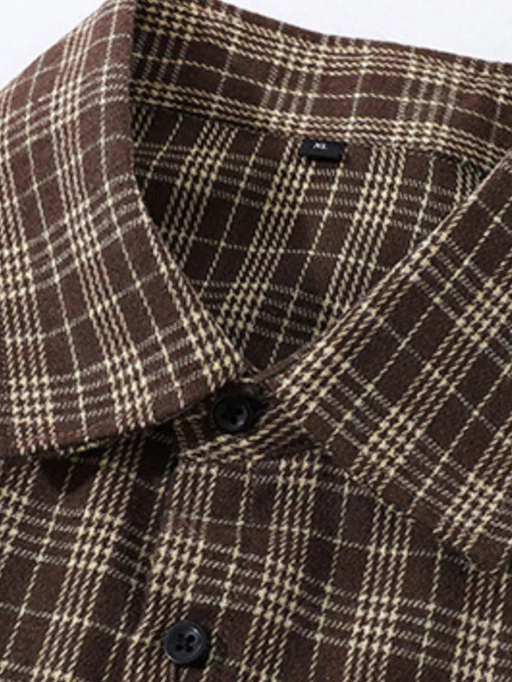 Classic oversized plaid button-front shirt in chocolate brown with white accents.