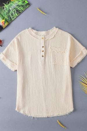 Beige textured gauze henley shirt with raw edges, button placket, and chest pocket.