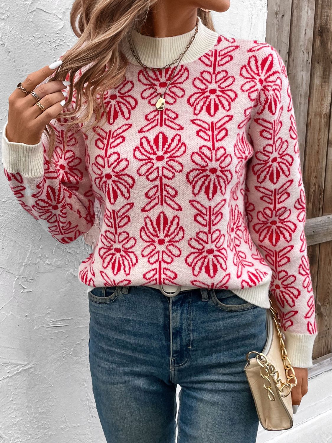 Intarsia floral crewneck knit sweater in scarlet and cream acrylic with a mock neck.