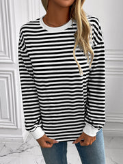 Horizontal stripe crewneck sweatshirt with white cuffs and crew neckline.