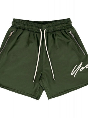 Army green jogger shorts with drawstring and zippered pockets