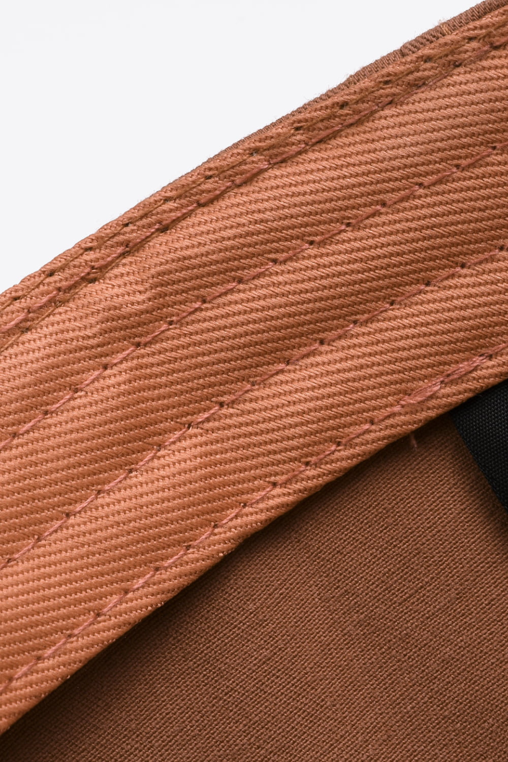 Rugged Urban Flex Cap baseball cap in coral with detailed stitching.