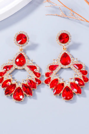 Red crystal drop earrings with gold alloy setting and floral-inspired design.