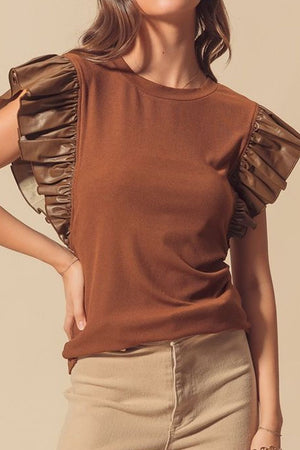 Brown blouse with ruffled faux leather cap sleeves.