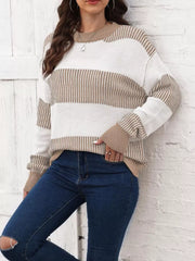 Cozy knit sweater with tan and white stripes, crew neck, long sleeves.