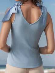 Light blue ribbed knit tank top with tie shoulder bows and V-neck.