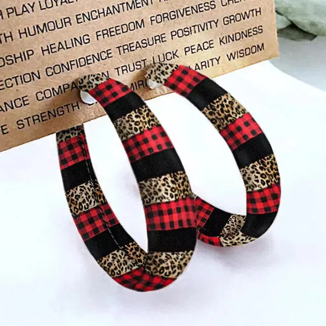 Red buffalo check and leopard print statement hoop earrings.