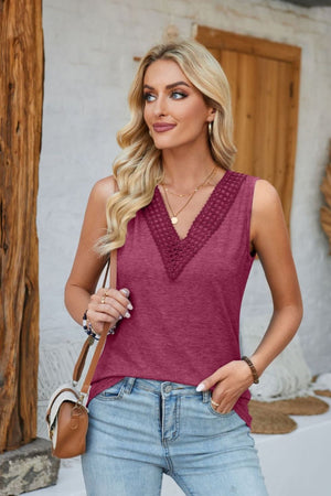 V-neck tank top in a deep pink hue with crochet trim detail on the neckline.