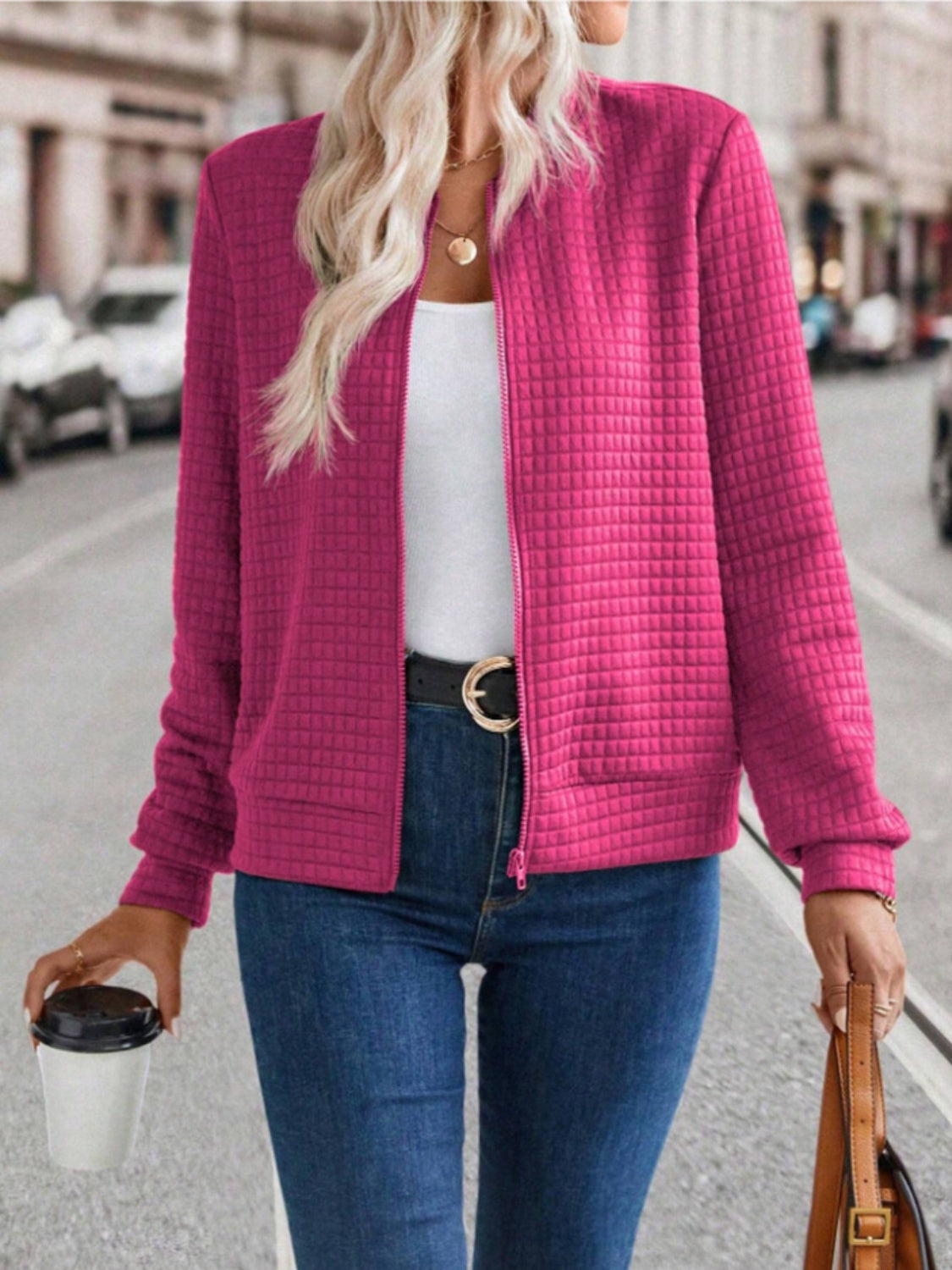 Quilted bomber jacket in Deep Rose with zip closure and pockets.