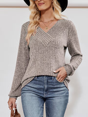 Textured ribbed V-neck pullover sweater in heather gray, featuring a relaxed fit and long sleeves.