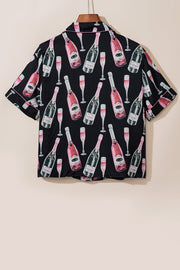 Black silk pajama shirt with champagne bottle and flute print