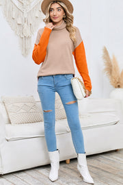 Colorblock knit turtleneck sweater in tan with orange sleeves, acrylic, casual style