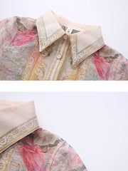 Pastel floral print button-down shirt dress with ornate collar detail.