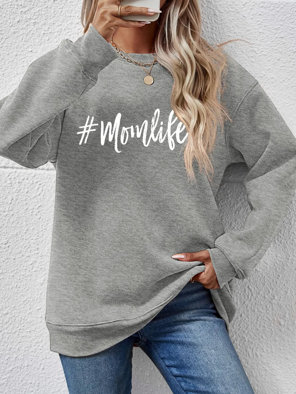 Crewneck sweatshirt in Charcoal with white #Momlife graphic print.