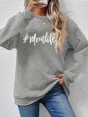 Crewneck sweatshirt in Charcoal with white #Momlife graphic print.