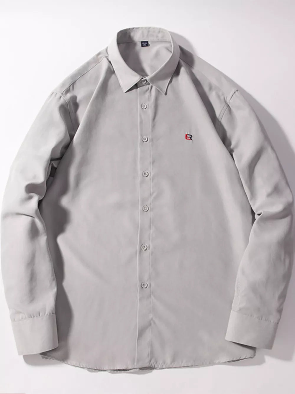 Light gray button-up shirt with red embroidered logo detail