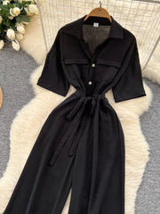 Black belted wide-leg maternity jumpsuit with pockets and button front