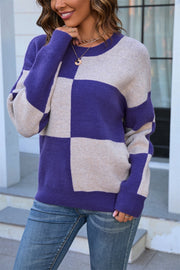 Checkerboard knit crewneck sweater in indigo and beige acrylic with a relaxed fit.