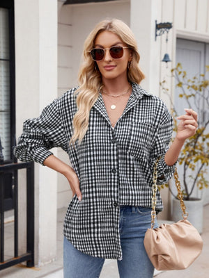 Oversized black and white gingham shirt jacket with pocket and button front.