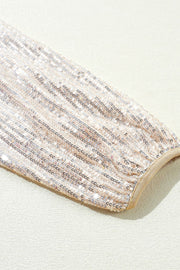 Sequin bomber jacket sleeve in cream with ribbed trim detail.