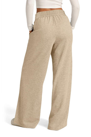 Seamed palazzo lounge trousers in tan with elastic waist and wide leg.