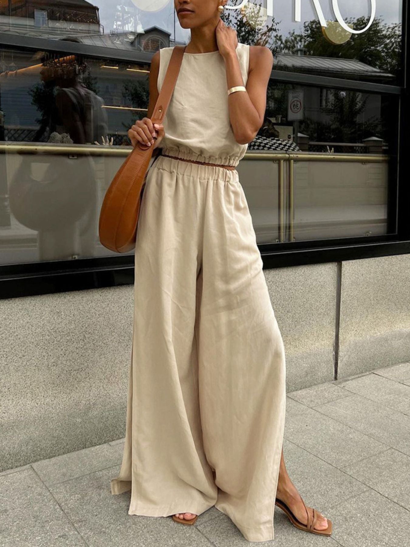 Sleeveless crew neck crop top and tan wide-leg pants set with elastic waist