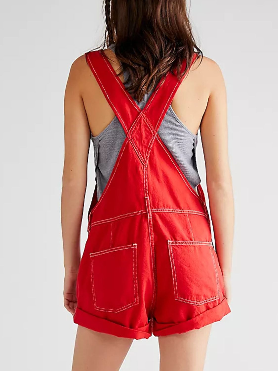 Crimson denim short overalls with contrast stitching and cuffed hems