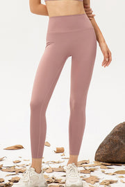 Dusty Pink high-waisted skinny fit leggings with seamless detailing.