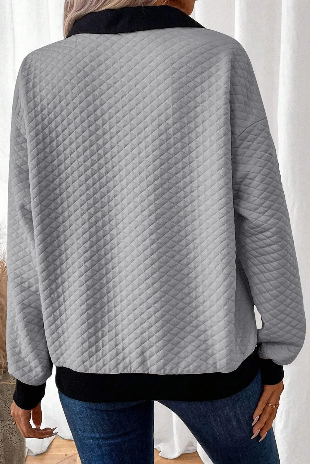 Gray diamond quilted polo sweatshirt with black collar and hem