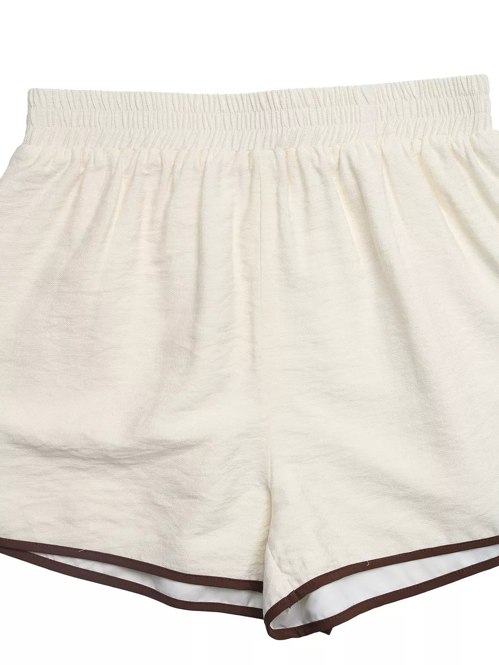 Beige shorts with elastic waistband and brown trim detail