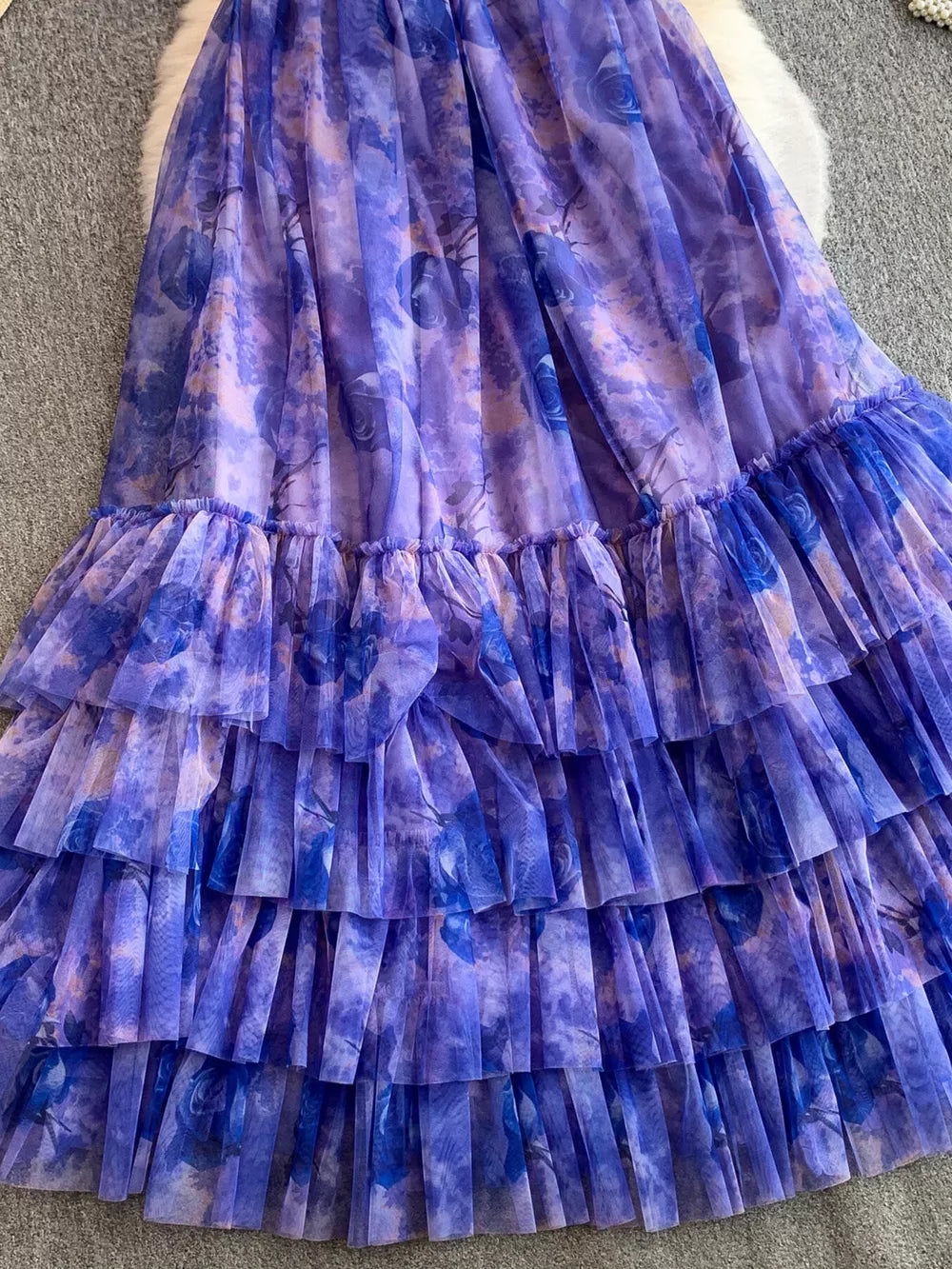 Romantic floral mesh maxi dress in electric purple with tiered ruffles.