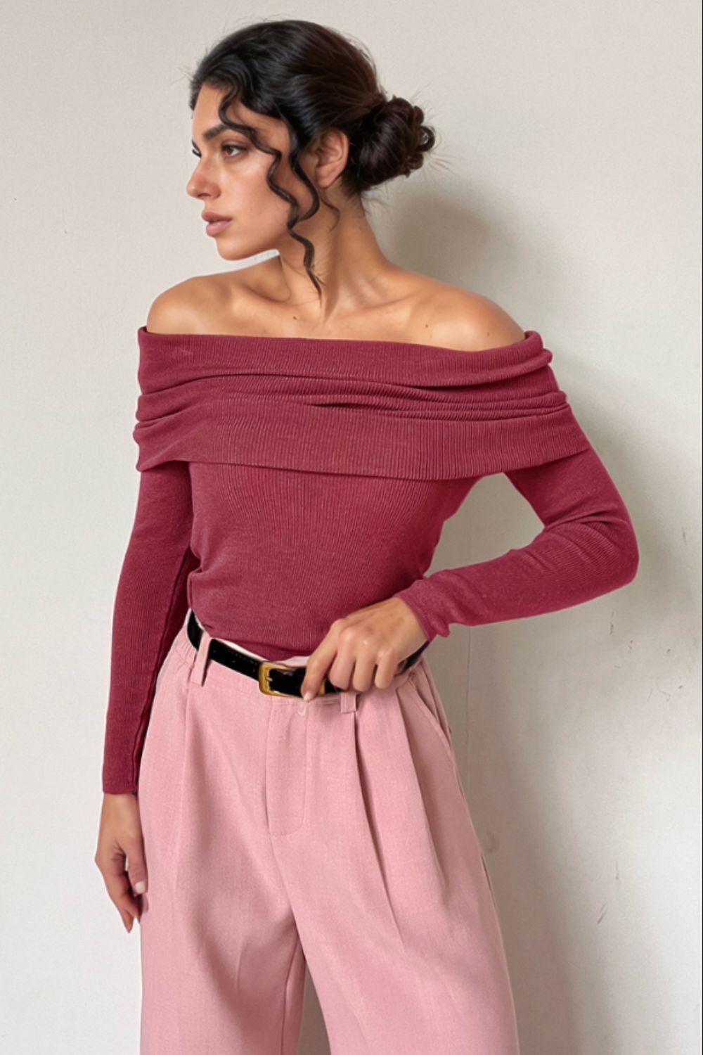 Off-the-shoulder ribbed knit top in Deep Rose with draped neckline.