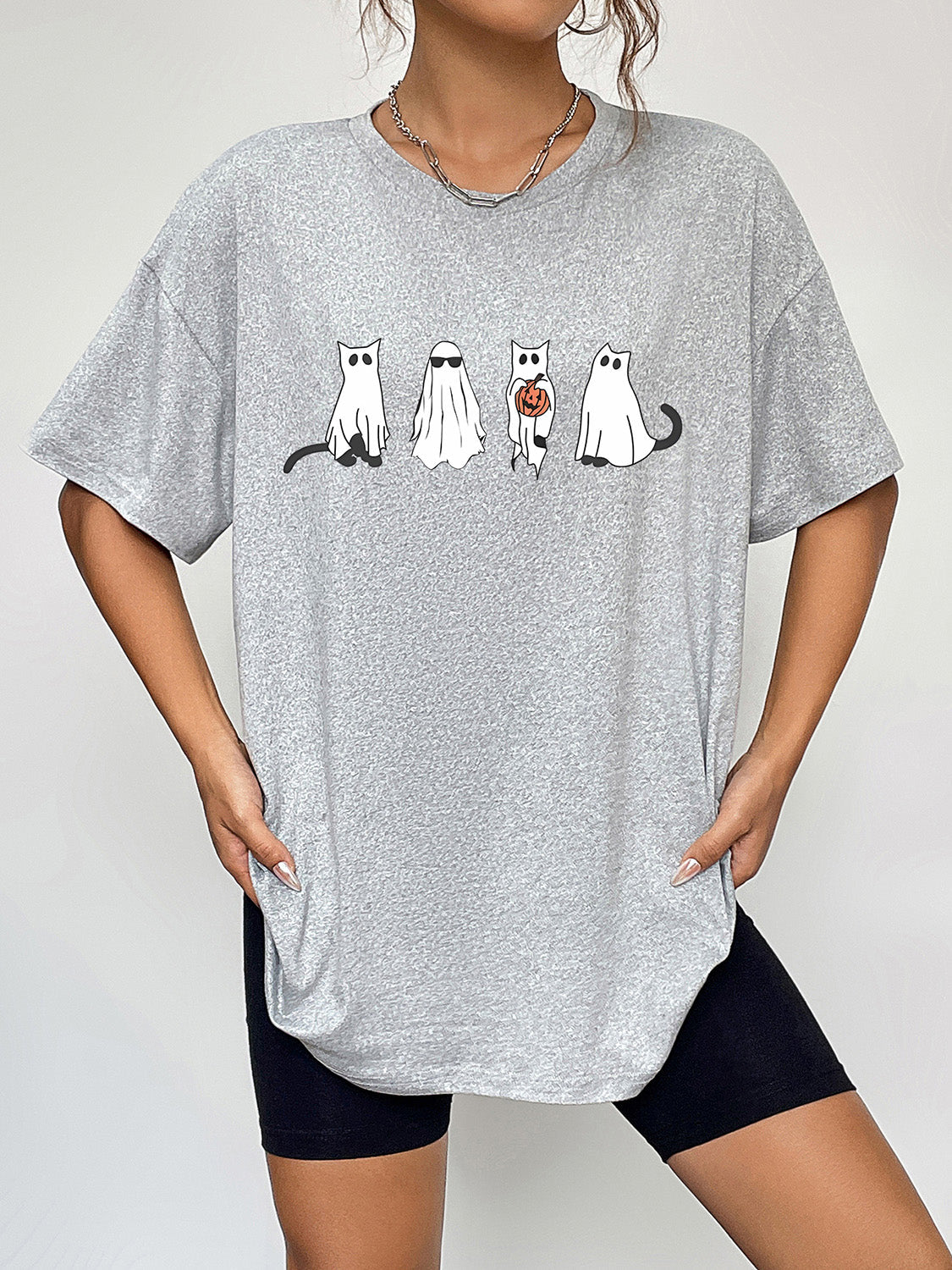 Grey graphic t-shirt with spooky cat and ghost print